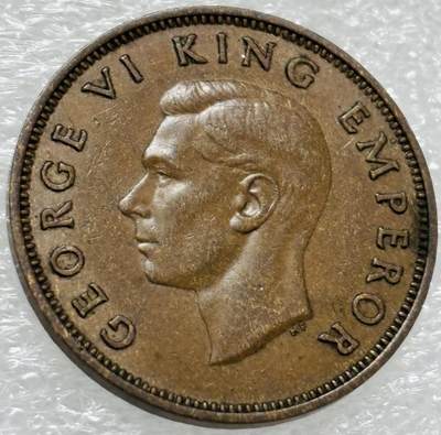 文馨钱币收藏第 302 场，国外回流老铜币，中东阿拉伯地区，拉美等国货币，30 号 1 号二连拍，长期接代拍业务，预计 4 月 4-5 号发货 极美品 1940 年英属新西兰乔治六世半便士铜币