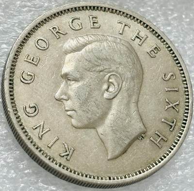 文馨钱币收藏第 302 场，国外回流老铜币，中东阿拉伯地区，拉美等国货币，30 号 1 号二连拍，长期接代拍业务，预计 4 月 4-5 号发货 好品 1950 年英属新西兰乔治六世 1 佛罗琳