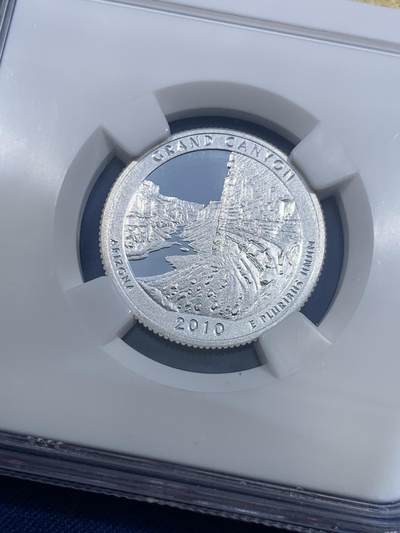 《竞宝斋》第484场 周日，周一，周二 3场连拍 （全场包邮）20级店铺 欢迎送拍 NGC PF69UC 美国2010年美丽美国-大峪谷国家公园1/4元精制银币，PROOF精制币，打制精美 状态佳。