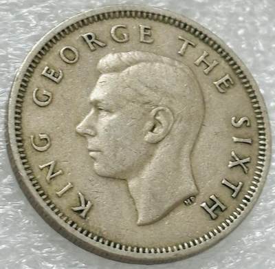 文馨钱币收藏第 302 场，国外回流老铜币，中东阿拉伯地区，拉美等国货币，30 号 1 号二连拍，长期接代拍业务，预计 4 月 4-5 号发货 1950 年英属新西兰乔治六世 1 先令