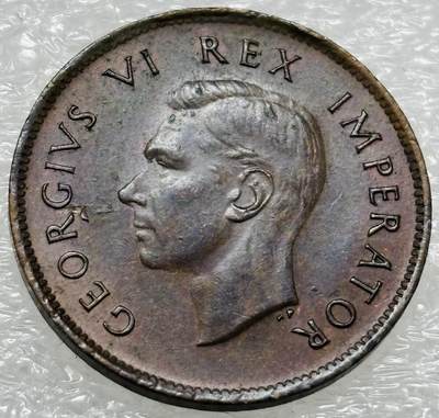 文馨钱币收藏第 302 场，国外回流老铜币，中东阿拉伯地区，拉美等国货币，30 号 1 号二连拍，长期接代拍业务，预计 4 月 4-5 号发货 少见极美品 1943 年英属南非乔治六世 1/4 便士铜币