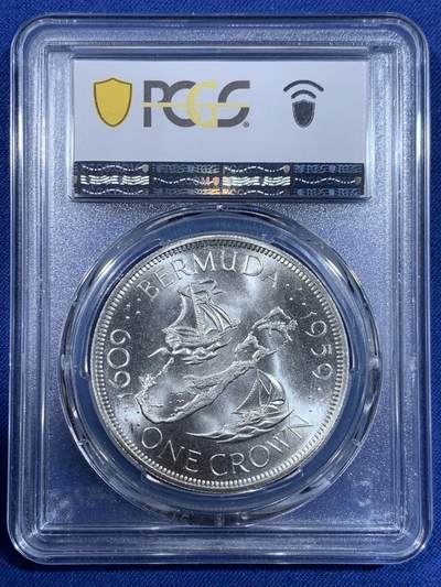 《竞宝斋》第484场 周日，周一，周二 3场连拍 （全场包邮）20级店铺 欢迎送拍 PCGS MS67 英属百慕大群岛1959年伊丽莎白二世1克朗纪念银币，币面清爽干净又舒适，转光强烈细节优秀，状态一流。