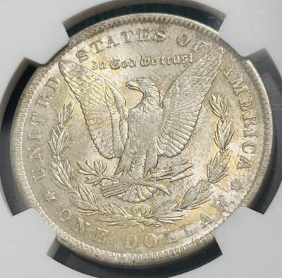 文馨钱币收藏第 303 场，【五一钱币荟，收藏盛宴】长期接代拍业务 NGC MS64  1884 年美国摩根鹰洋银元 O 版，淡淡金黄环边，金彩包浆，细节看图