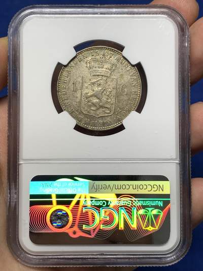 《竞宝斋》第484场 周日，周一，周二 3场连拍 （全场包邮）20级店铺 欢迎送拍 NGC AUD 荷兰1907年威廉敏娜少女头一盾银币，包浆很不错，尤其背面带五彩包浆，个人感觉严评了