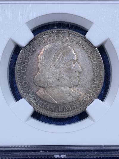 《竞宝斋》第484场 周日，周一，周二 3场连拍 （全场包邮）20级店铺 欢迎送拍 NGC MS64 美国 1893年 哥伦布半美元纪念银币 双面蓝彩包浆 状态极美。近期有同品种62分不含佣成交价即达到800元以上