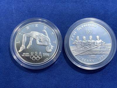 《竞宝斋》第484场 周日，周一，周二 3场连拍 （全场包邮）20级店铺 欢迎送拍 美国1996年亚特兰大百年奥运会系列-划船和跳高1美元2枚精制银币套 26.73克900银X2 盒证全