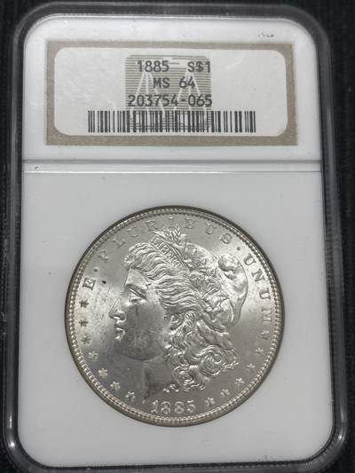 文馨钱币收藏第 303 场，【五一钱币荟，收藏盛宴】长期接代拍业务 NGC MS64  1885 年美国摩根鹰洋银元 老盒严评，炸裂转光，无需多言，细节看图