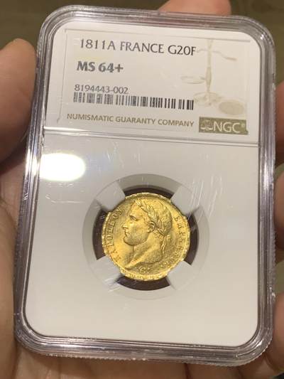 《竞宝斋》第484场 周日，周一，周二 3场连拍 （全场包邮）20级店铺 欢迎送拍 季军分 NGC MS64+ 法国1811年拿破仑一世20法郎金币 流通金币好品难得。正反面图案清晰，压力足，值得收藏。实物金光灿灿，满转光，一级品相，可收藏观赏性也较好。高分拿皇金币一直是外拍的抢手货，国内几乎未见此收藏级品相，64+高分此时拥有即刻毕业。