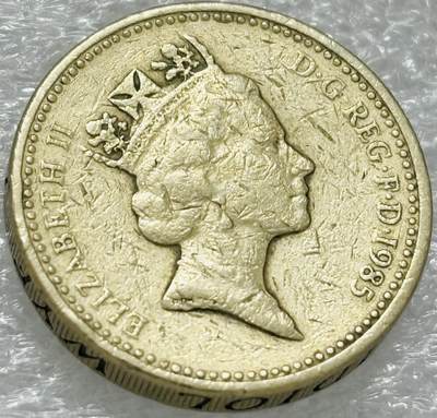 文馨钱币收藏第 302 场，国外回流老铜币，中东阿拉伯地区，拉美等国货币，30 号 1 号二连拍，长期接代拍业务，预计 4 月 4-5 号发货 1985 年 英国1镑威尔士韭葱