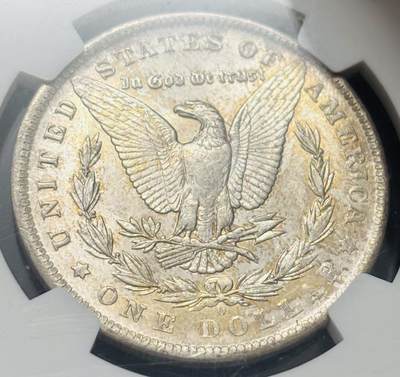 文馨钱币收藏第 303 场，【五一钱币荟，收藏盛宴】长期接代拍业务 NGC MS64  1884 年美国摩根鹰洋银元 O 版，淡淡金黄环边，金彩包浆，细节看图