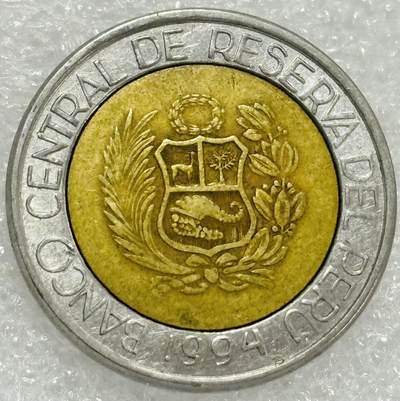 文馨钱币收藏第 302 场，国外回流老铜币，中东阿拉伯地区，拉美等国货币，30 号 1 号二连拍，长期接代拍业务，预计 4 月 4-5 号发货 1994 年秘鲁 2 索尔双色纪念币