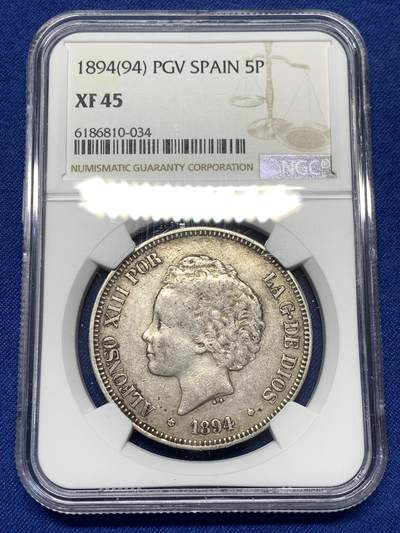 《竞宝斋》第484场 周日，周一，周二 3场连拍 （全场包邮）20级店铺 欢迎送拍 NGC XF45 西班牙1894年阿方索十三世爆炸头5比塞塔银币 原味自然包浆 45已属难得