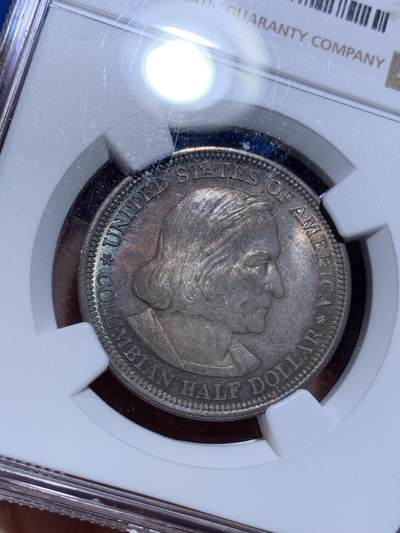 《竞宝斋》第484场 周日，周一，周二 3场连拍 （全场包邮）20级店铺 欢迎送拍 NGC MS64 美国 1893年 哥伦布半美元纪念银币 双面蓝彩包浆 状态极美。近期有同品种62分不含佣成交价即达到800元以上