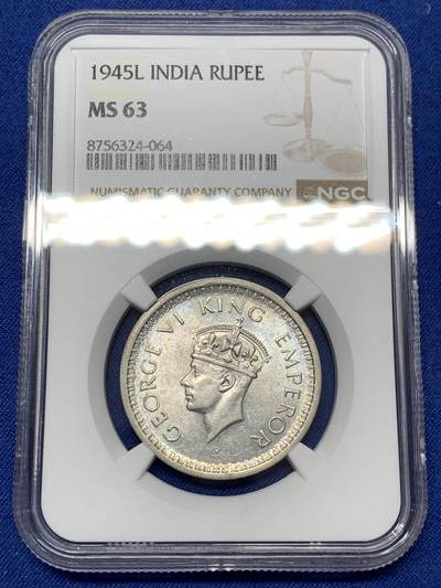 《竞宝斋》第484场 周日，周一，周二 3场连拍 （全场包邮）20级店铺 欢迎送拍 NGC MS63 英属印度1945-L一卢比银币，拉合尔厂少见，不是常见的B或C厂