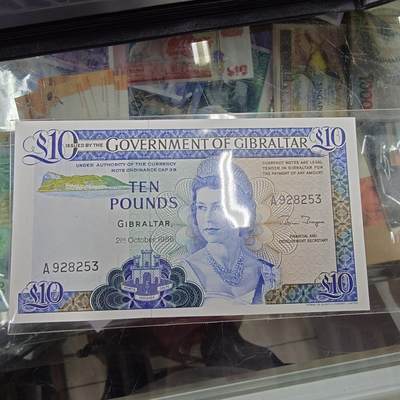 世界钱币～微拍第248期暨2026年第29期  少量老库存低价起拍 1986年直布罗陀10镑 全新绝品A冠无47尾号253