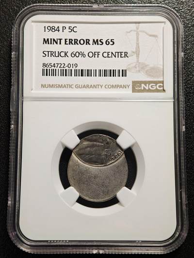 【德藏】世界币章拍卖第179期 - NGC Mint Error MS65 1984-P美国5美分镍币偏打错版，打偏约60%，杰斐逊镍币残片图案，原光品相，错版特征清晰