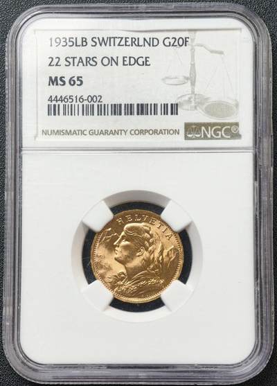 NGC-MS65 瑞士 1935年 瑞士20法郎雪山少女金币 边齿22星稀有版 900金，重6.45g，经典雪山少女侧像，发丝细腻，轮廓锐利，原光温润，瑞士国徽盾牌+十字+橡叶花环，细节立体，币面洁净无损