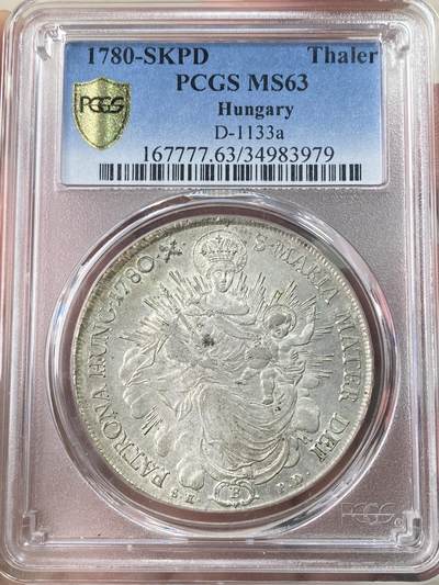 万国钱币拍卖第074期 - PCGS MS63 1780年匈牙利神圣罗马帝国皇帝约瑟夫二世圣母抱婴泰勒 克雷姆琴察造币厂铸 高品罕见的神罗匈牙利系列 PC亚军分更高仅一枚 圣光环绕着圣母与圣子 背面两位大天使献上祝福 超级深铸银光充沛无减重痕难得典藏级神罗大泰勒